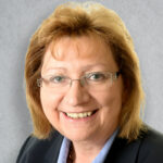 Small headshot of Anne Hutchings
