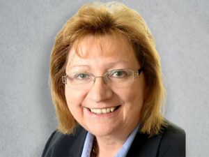 Close up headshot of Anne Hutchings CEO of Hutchings Pharmacy Sales and Valuations
